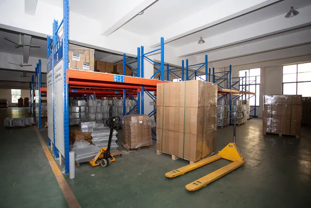 Finished goods racks with a manual pallet truck